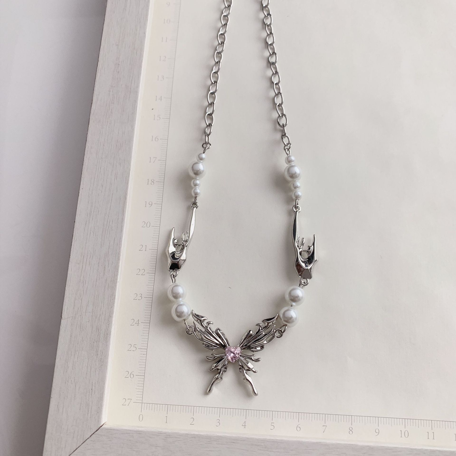 Подвеска "Бабочка" с розовым камнем-сердцем в середине